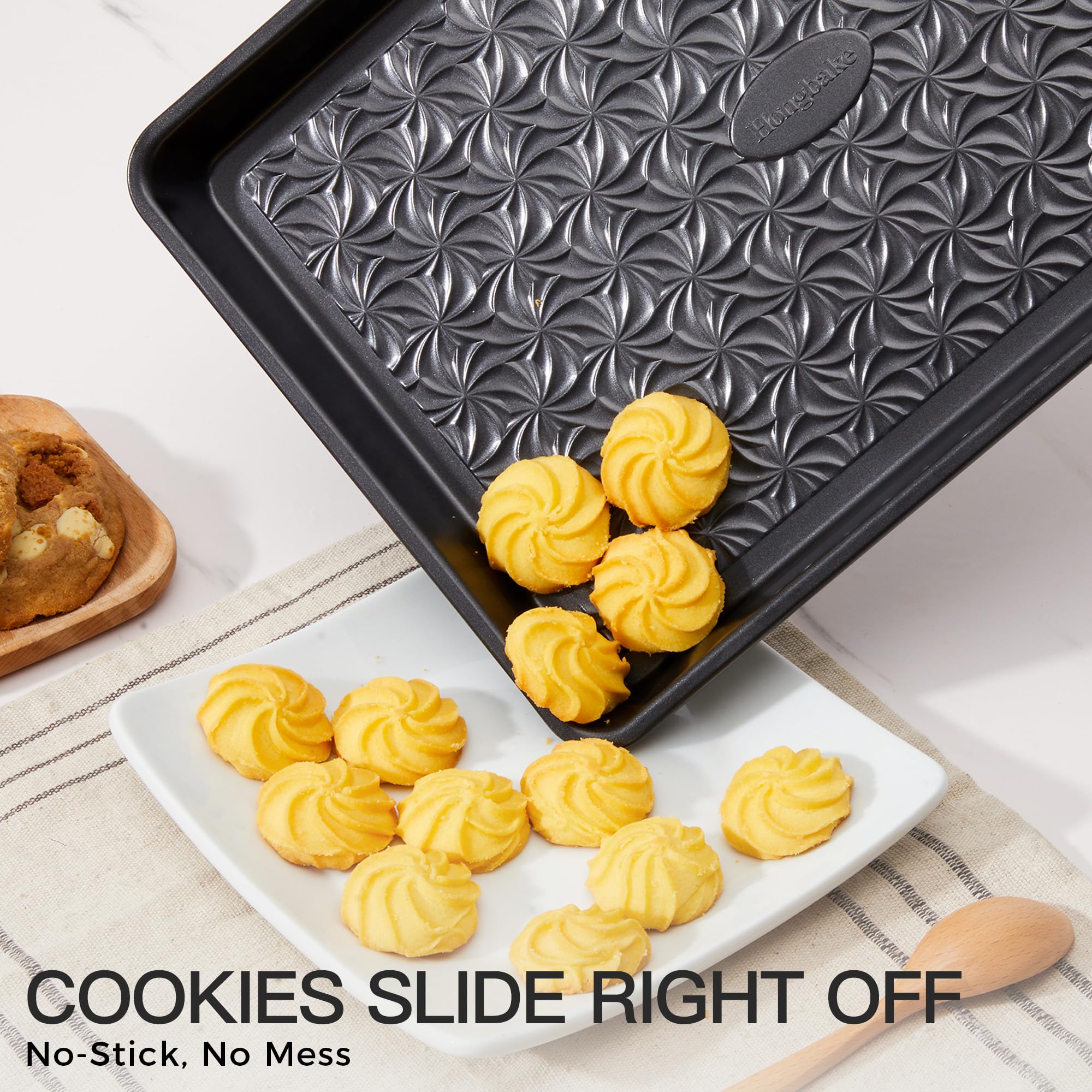 Floral swirl texture baking sheet set with three rimmed pans designed for even heating and easy release