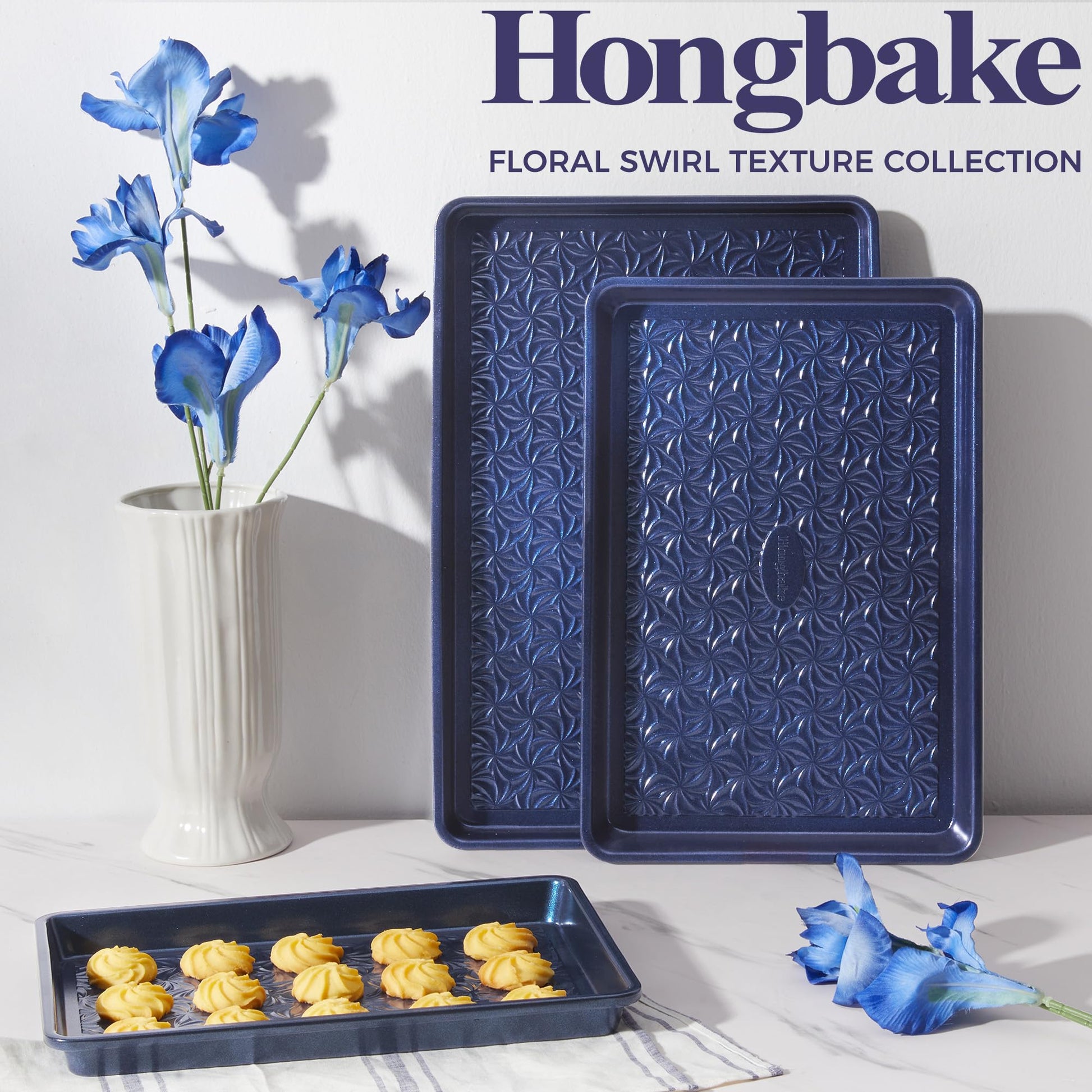 Floral swirl texture baking sheet set with three rimmed pans designed for even heating and easy release