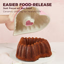 Heart-shaped Bundt pan with ceramic nonstick interior, 10-cup capacity