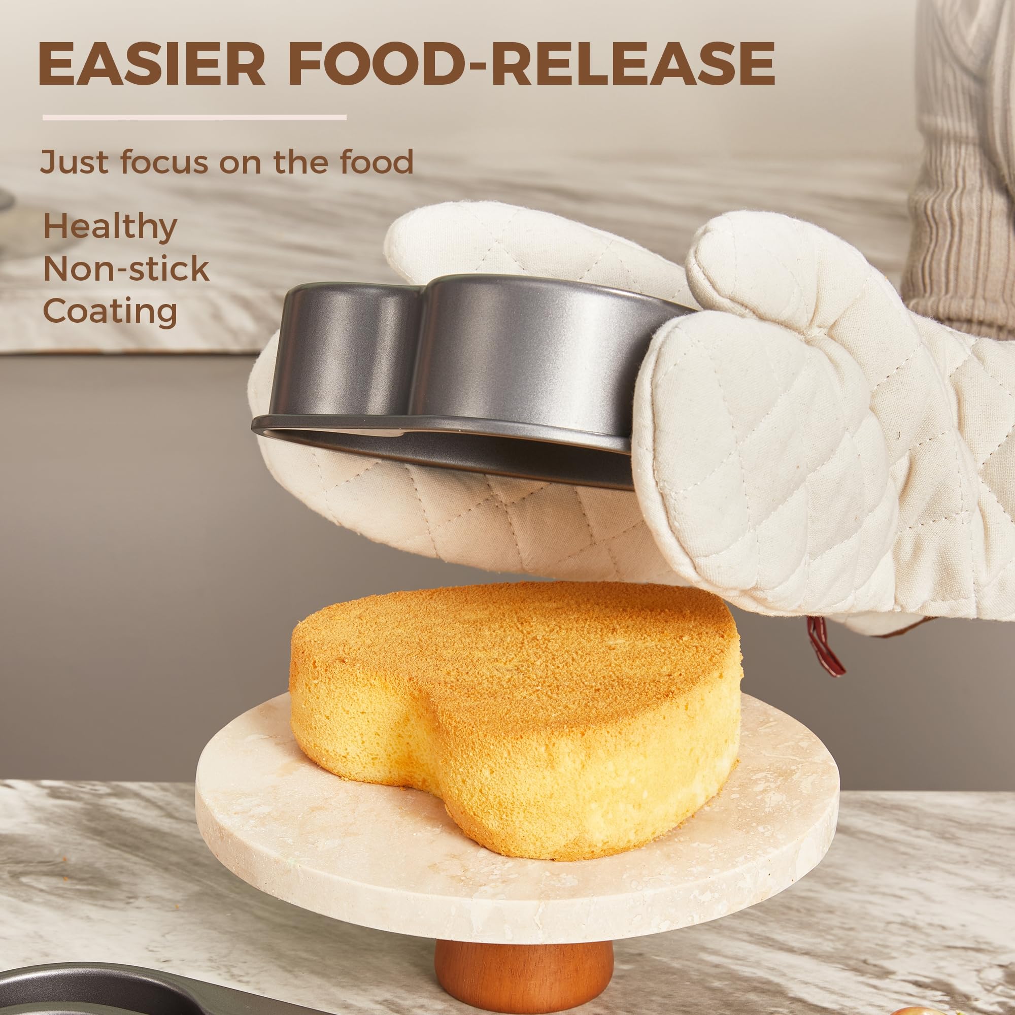Heart-shaped nonstick cake pan set with two stackable sizes for layered cakes and desserts, dark gray